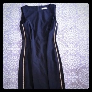 Black Calvin Klein dress gold chain detail wedding